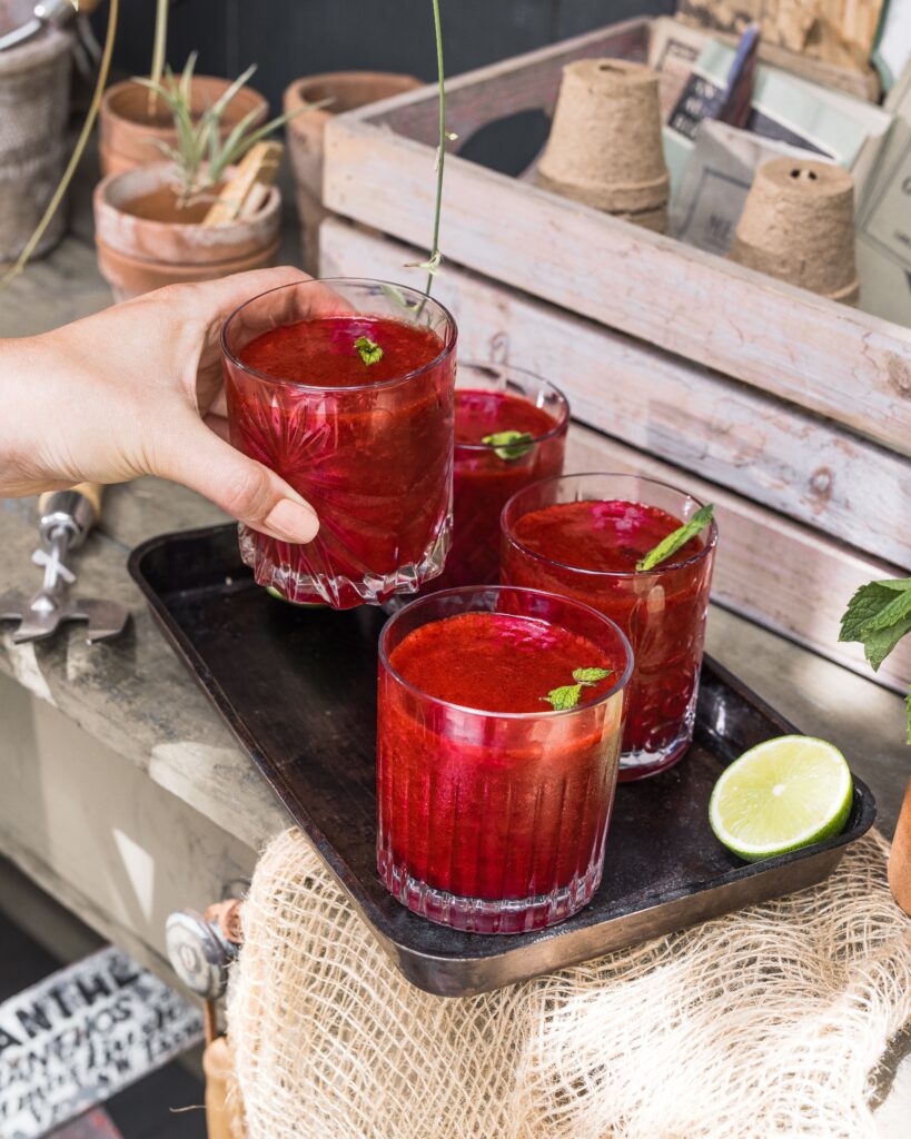Queen Garnet plum summer slushie served on a tray